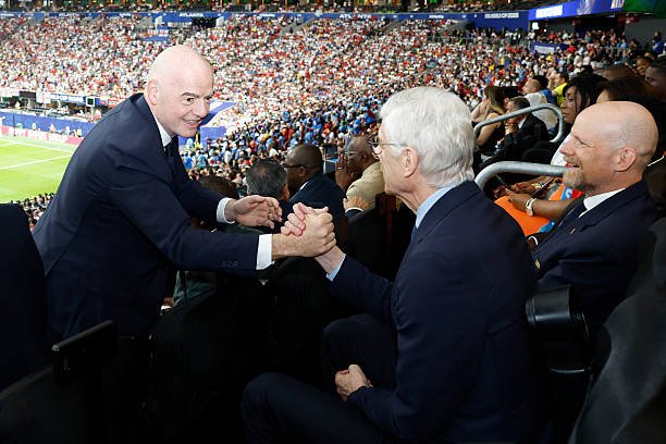 Gianni Infantino, President of FIFA, shakes hands with Arsene Wenger, FIFA's Chief of Global Football Development, during the FIFA World Cup 2026...