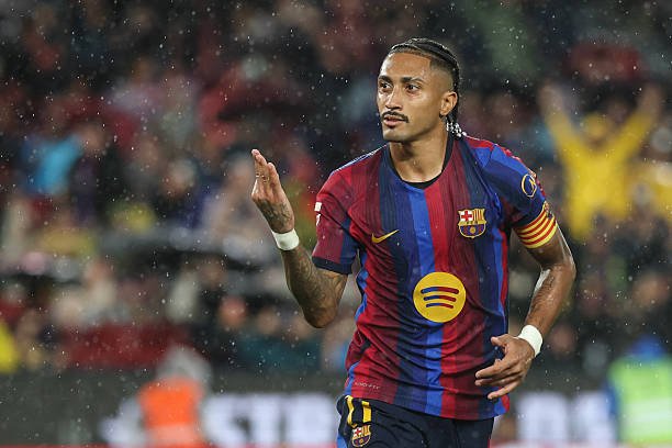 Barcelona's Brazilian forward Raphinha celebrates scoring his team's fifth goal and a hat-trick during the Spanish league football match between FC...