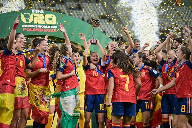 Cristina Libran of Spain U20 lifts the Women's U20 World Cup trophy during the celebration after the final match between Spain and DRP Korea at...
