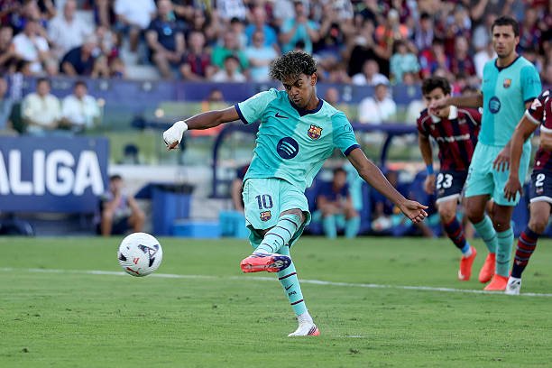 Lamine Yamal of Barcelona scores his teams third goal from the penalty spot during the LaLiga EA Sports 2026/27 match between Levante UD and FC...